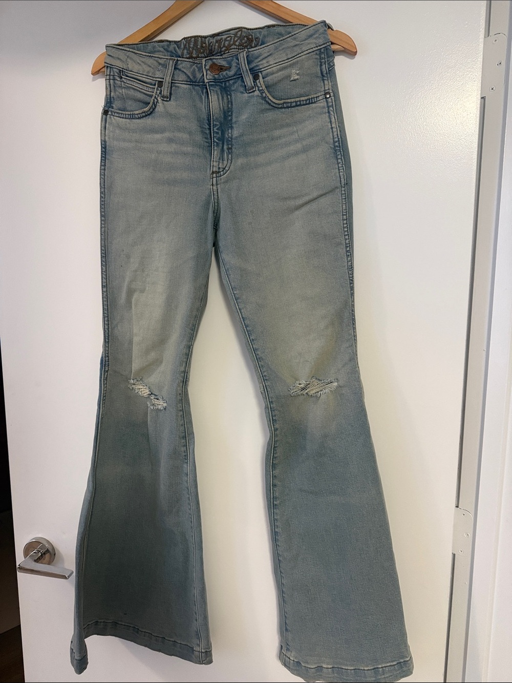 Wrangler Light Blue Flared Jeans with Knee Distress